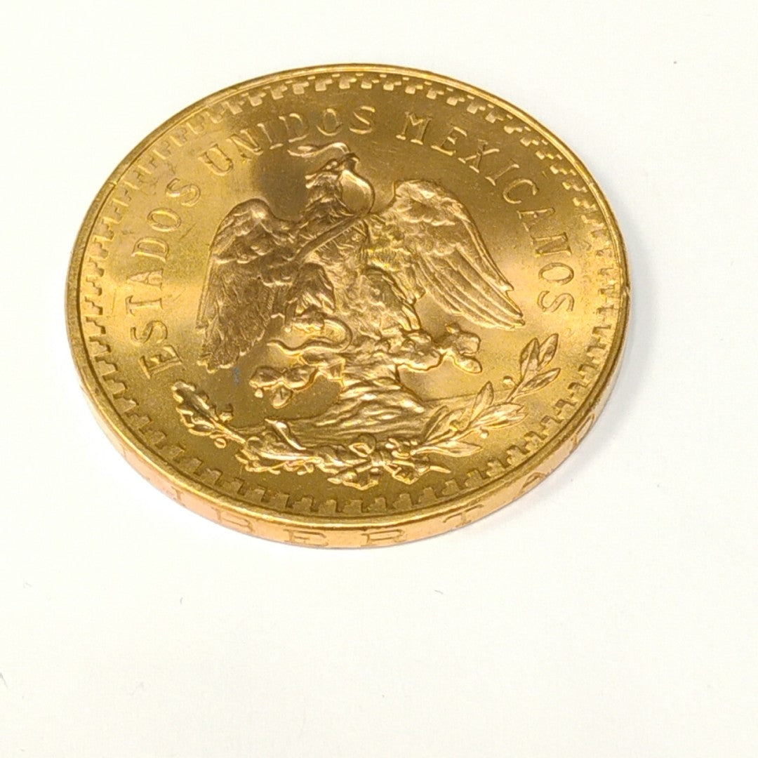 K1 41,60 GRMS - DTO. 0,00 GRMS - 21 K - AVALÚO 76003,20 * IDENTIFICACIÓN MONEDA NOMINATIVA * MONEDAS PESOS 50 PESOS (SEMINUEVO)