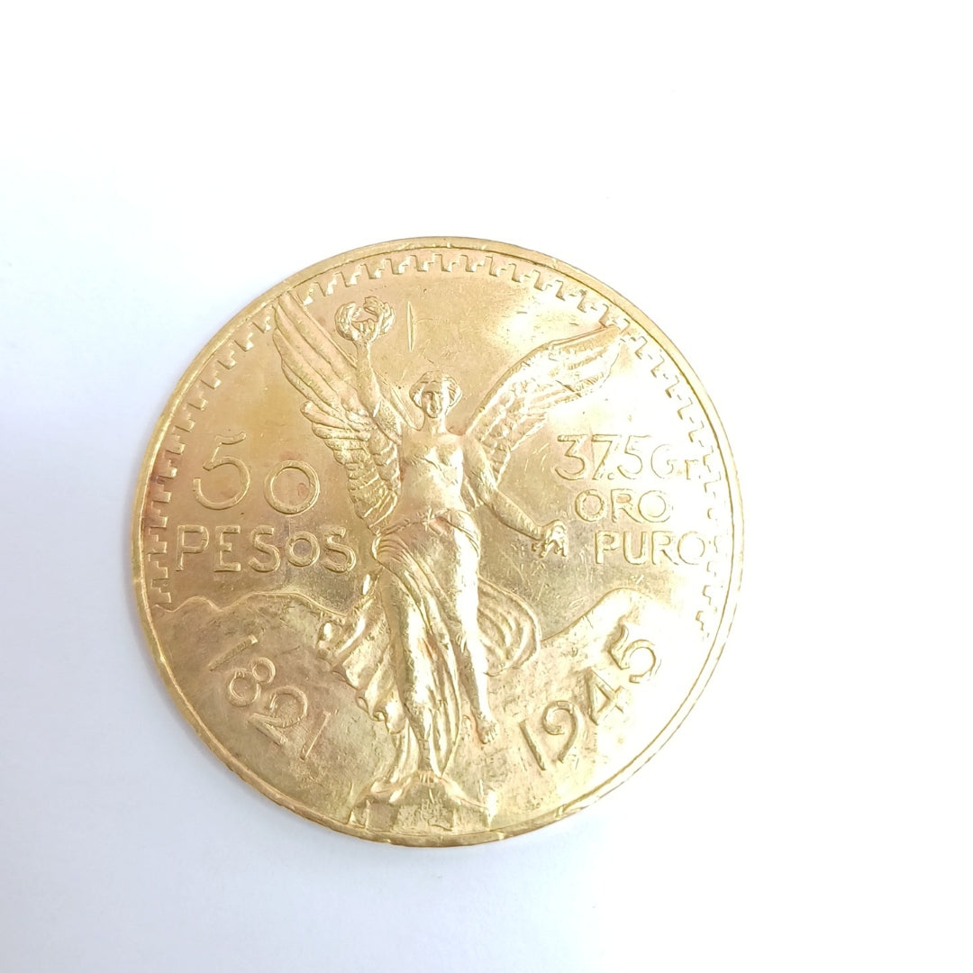 K1 41.6 GRMS - DESC. 0 GRAMOS - 21 K - AVALÚO 77688 * * IDENTIFICACIÓN MONEDA NOMINATIVA. * MONEDAS PESOS 50 PESOS. (SEMINUEVO)