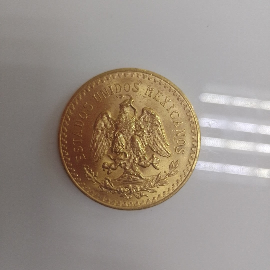 K1 41,60 GRMS - DTO. 0,00 GRMS - 21 K - AVALÚO 76003,20 * IDENTIFICACIÓN MONEDA NOMINATIVA * MONEDAS PESOS 50 PESOS (SEMINUEVO)