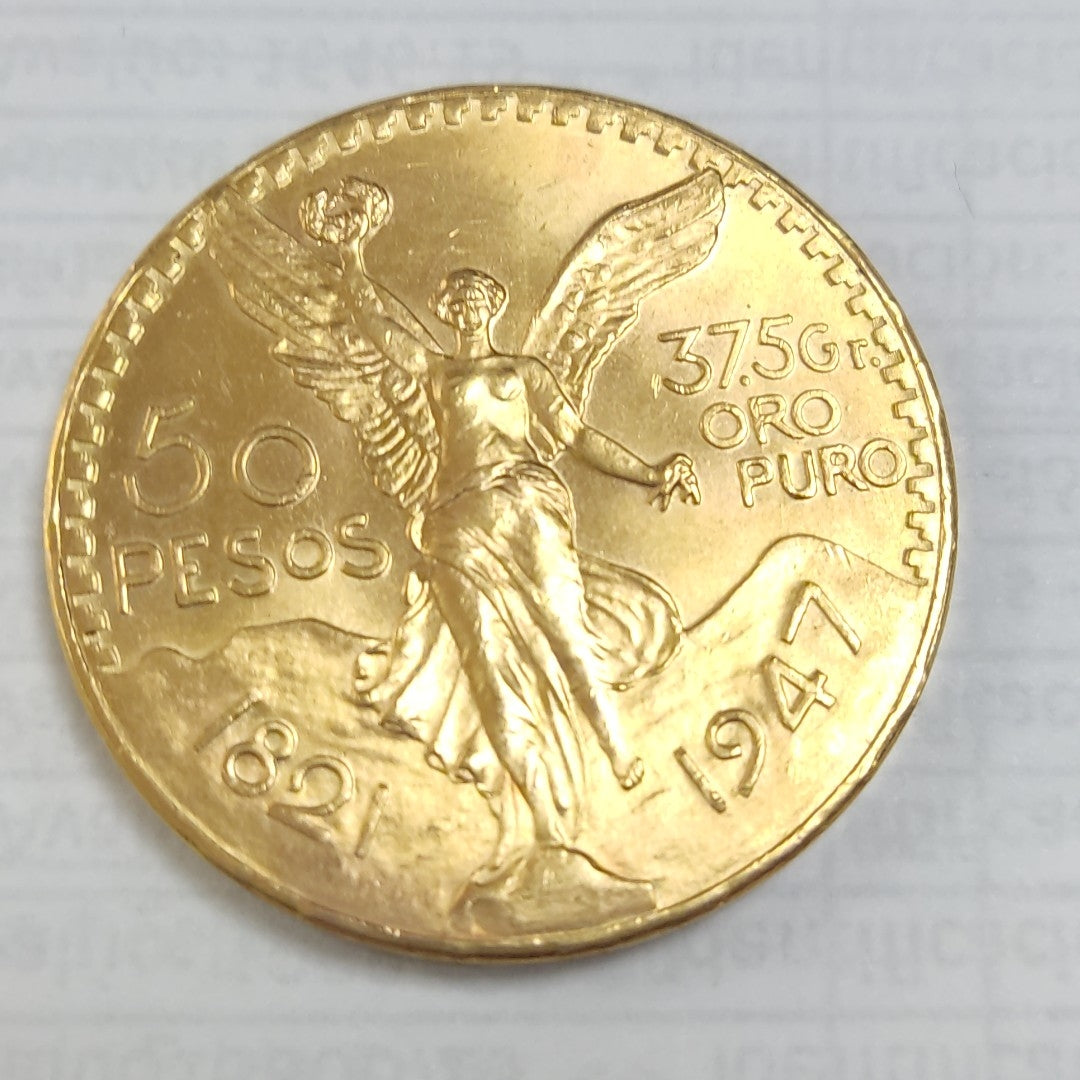 K1 41,60 GRMS - DTO. 0,00 GRMS - 21 K - AVALÚO 75894,21 * IDENTIFICACIÓN MONEDA NOMINATIVA * MONEDAS PESOS 50 PESOS (SEMINUEVO)
