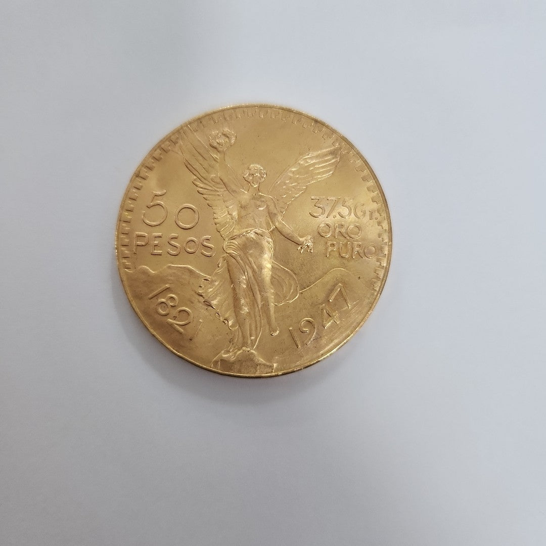 K1 41.6 GRMS - DESC. 0 GRAMOS - 21 K - AVALÚO 80496 * * IDENTIFICACIÓN MONEDA NOMINATIVA. * MONEDAS PESOS 50 PESOS. (SEMINUEVO)