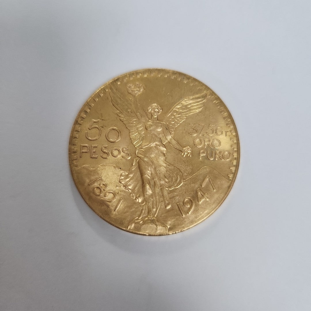 K1 41.6 GRMS - DESC. 0 GRAMOS - 21 K - AVALÚO 77126.4 * * IDENTIFICACIÓN MONEDA NOMINATIVA. * MONEDAS PESOS 50 PESO (SEMINUEVO)