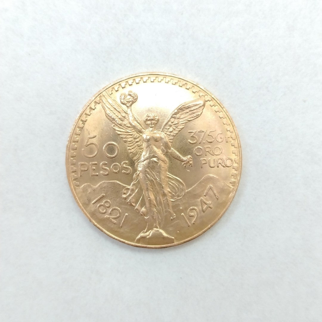 K1 41.6 GRMS - DESC. 0 GRAMOS - 21 K - AVALÚO 76377.6 * * IDENTIFICACIÓN MONEDA NOMINATIVA. * MONEDAS PESOS 50 PESO (SEMINUEVO)