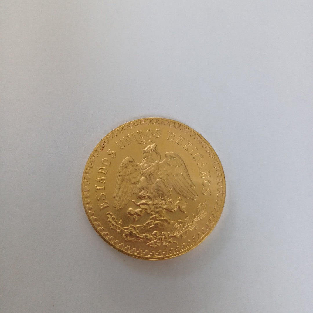 K1 41.6 GRMS - DESC. 0 GRAMOS - 21 K - AVALÚO 71884.8 * * IDENTIFICACIÓN MONEDA NOMINATIVA. * MONEDAS PESOS 50 PESO (SEMINUEVO)