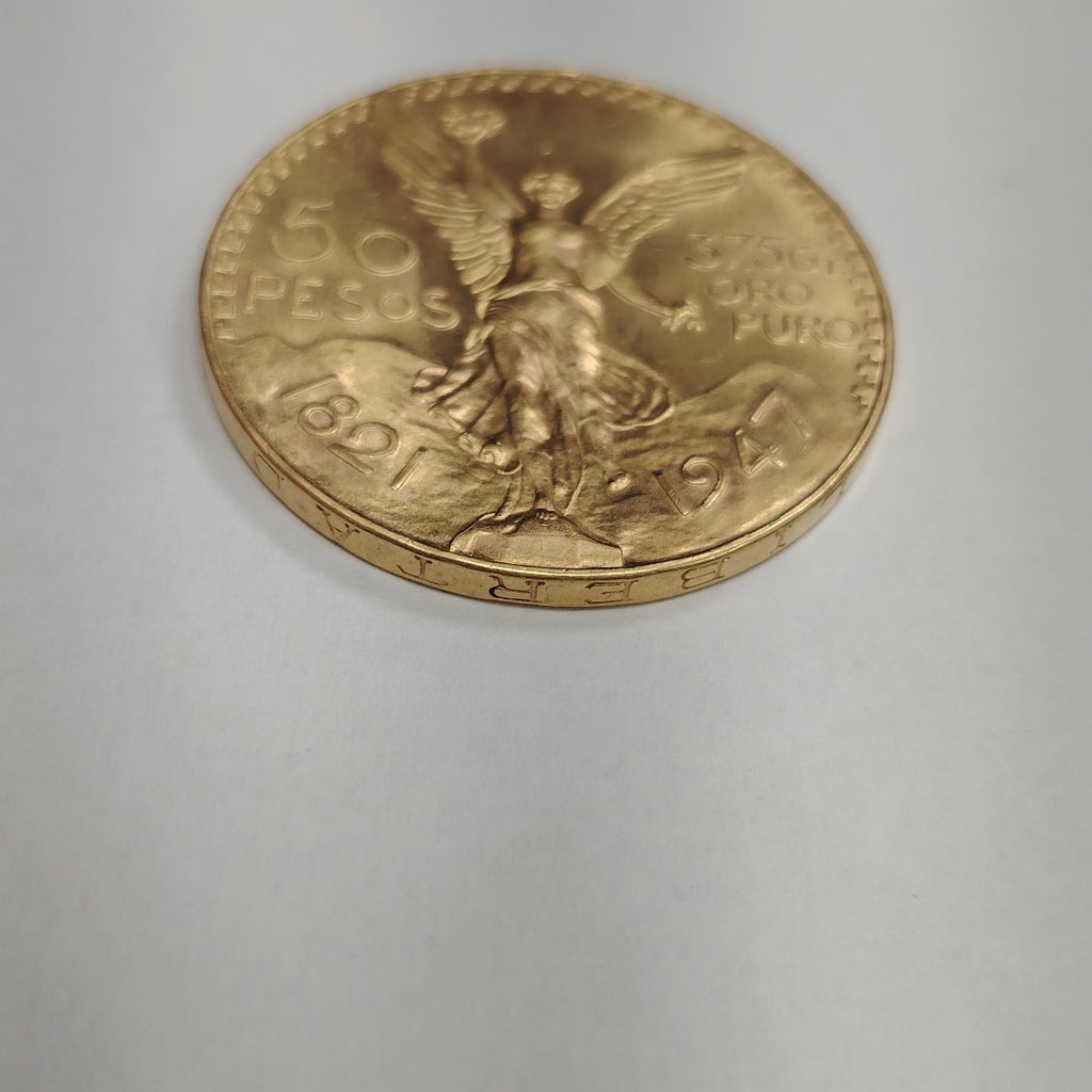 K1 41.6 GRMS - DESC. 0 GRAMOS - 21 K - AVALÚO 77126.4 * * IDENTIFICACIÓN MONEDA NOMINATIVA. * MONEDAS PESOS 50 PESO (SEMINUEVO)