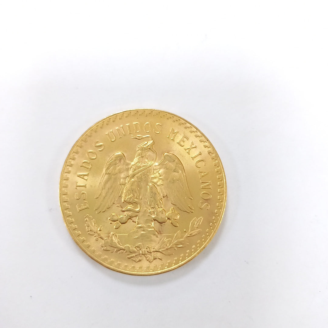 K1 41.6 GRMS - DESC. 0 GRAMOS - 21 K - AVALÚO 71884.8 * * IDENTIFICACIÓN MONEDA NOMINATIVA. * MONEDAS PESOS 50 PESO (SEMINUEVO)