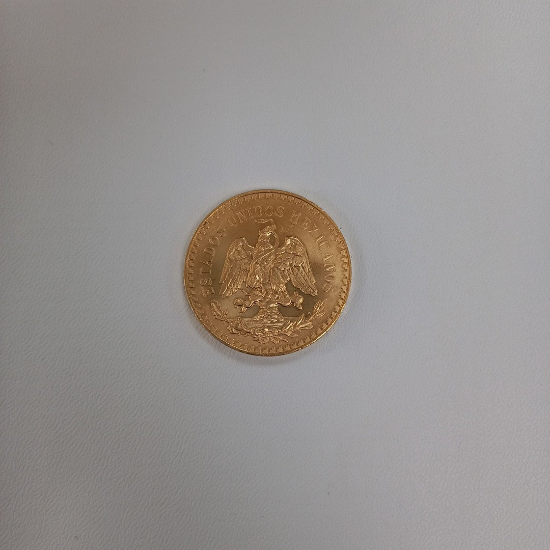 K1 41.6 GRMS - DESC. 0 GRAMOS - 21 K - AVALÚO 75254.4 * * IDENTIFICACIÓN MONEDA NOMINATIVA. * MONEDAS PESOS 50 PESO (SEMINUEVO)
