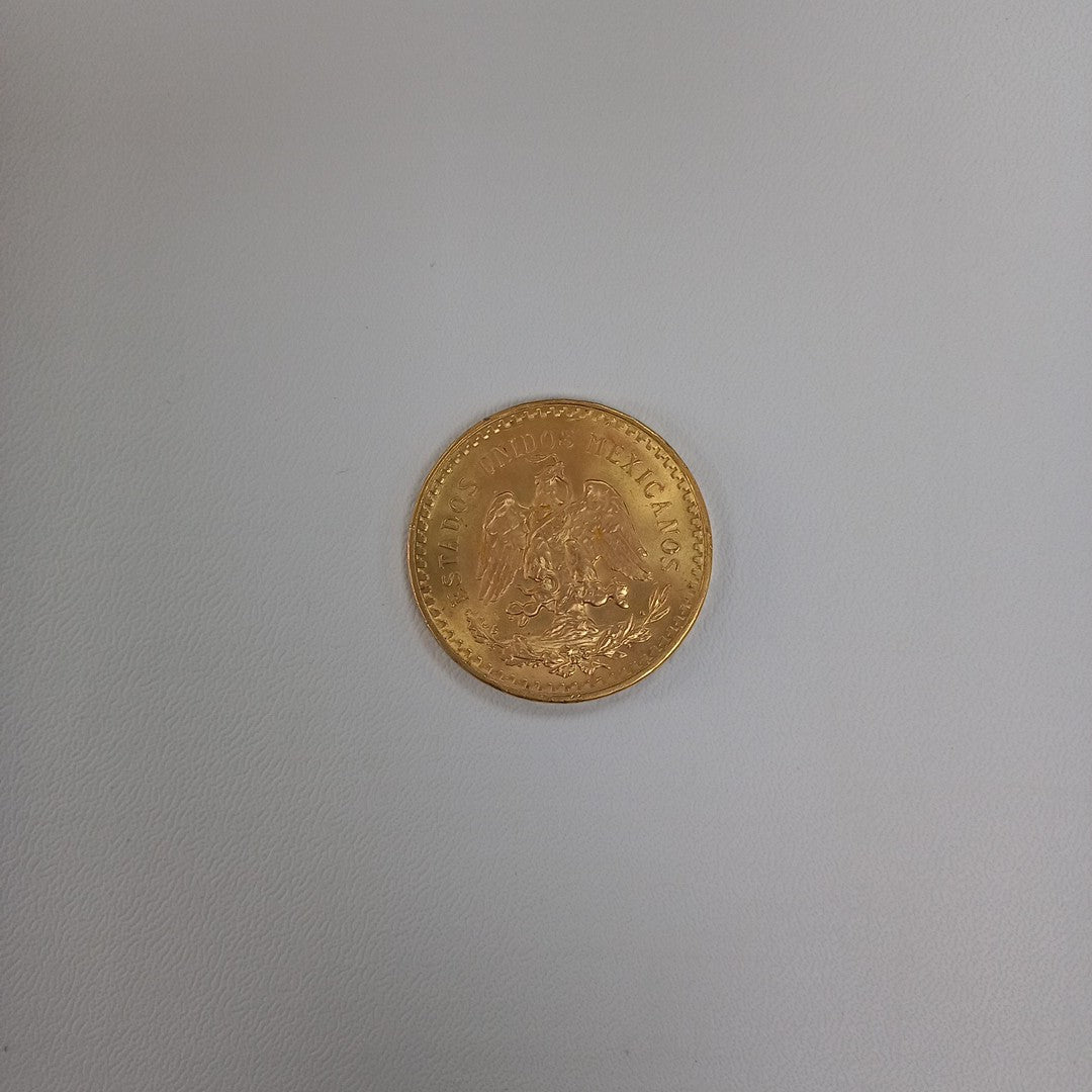 K1 41.6 GRMS - DESC. 0 GRAMOS - 21 K - AVALÚO 75254.4 * * IDENTIFICACIÓN MONEDA NOMINATIVA. * MONEDAS PESOS 50 PESO (SEMINUEVO)