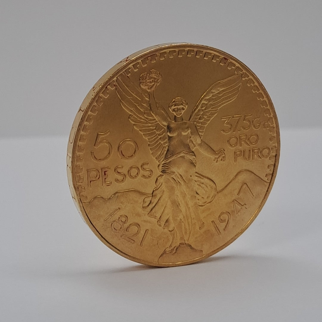 K1 41,60 GRMS - DTO. 0,00 GRMS - 21 K - AVALÚO 79534,21 * IDENTIFICACIÓN MONEDA NOMINATIVA * MONEDAS PESOS 50 PESOS (SEMINUEVO)