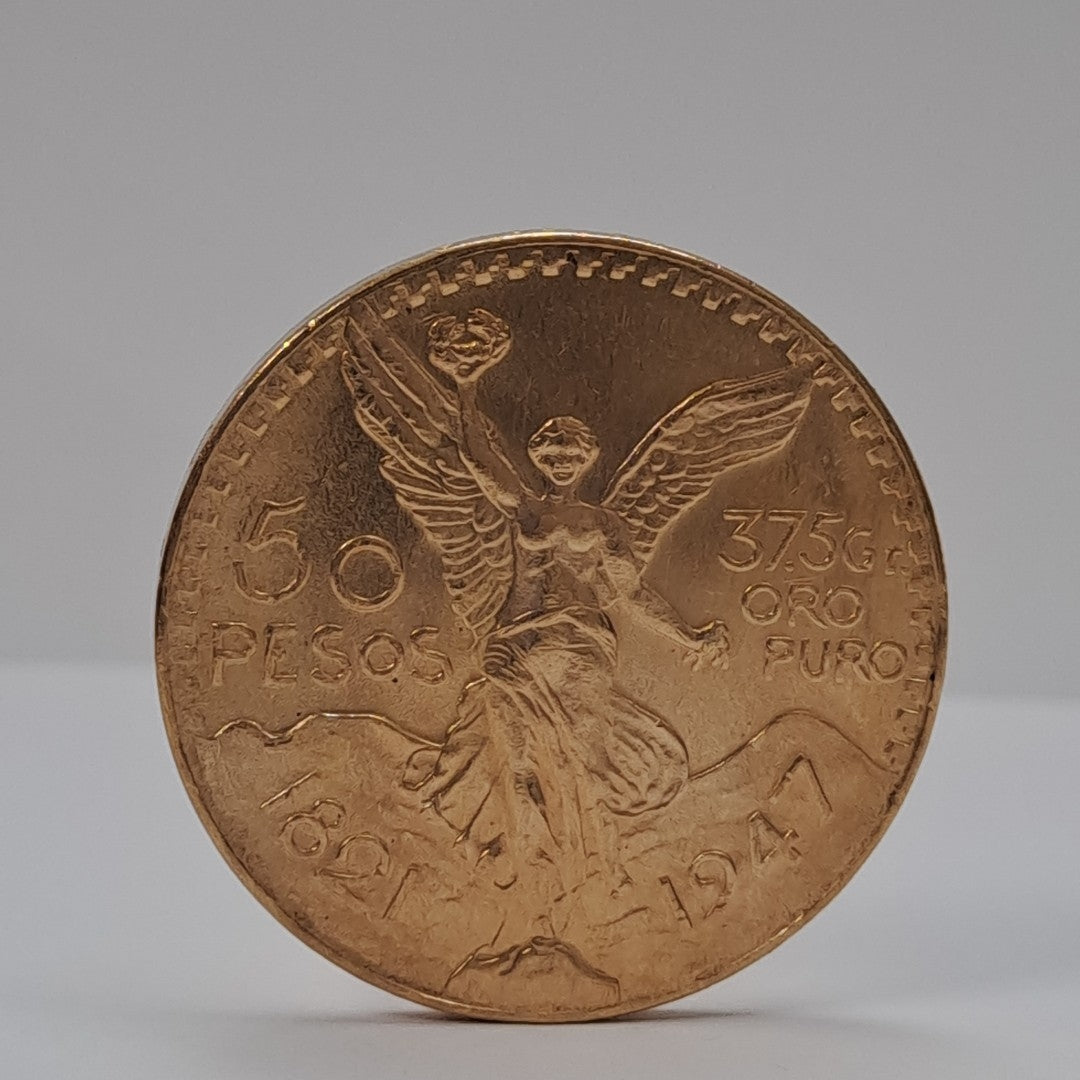 K1 41,50 GRMS - DTO. 0,00 GRMS - 21 K - AVALÚO 79343,02 * IDENTIFICACIÓN MONEDA NOMINATIVA * MONEDAS PESOS 50 PESOS (SEMINUEVO)