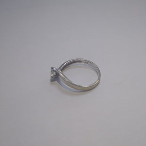 SOLITARIO. ORO BLANCO. 14 K 2.4 GRMS (SEMINUEVO)