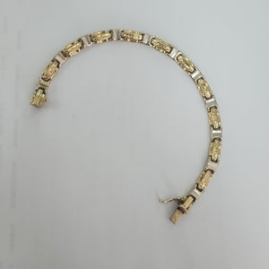 PULSERA. ORO COMBINADO. 14 K 10 GRMS (SEMINUEVO)