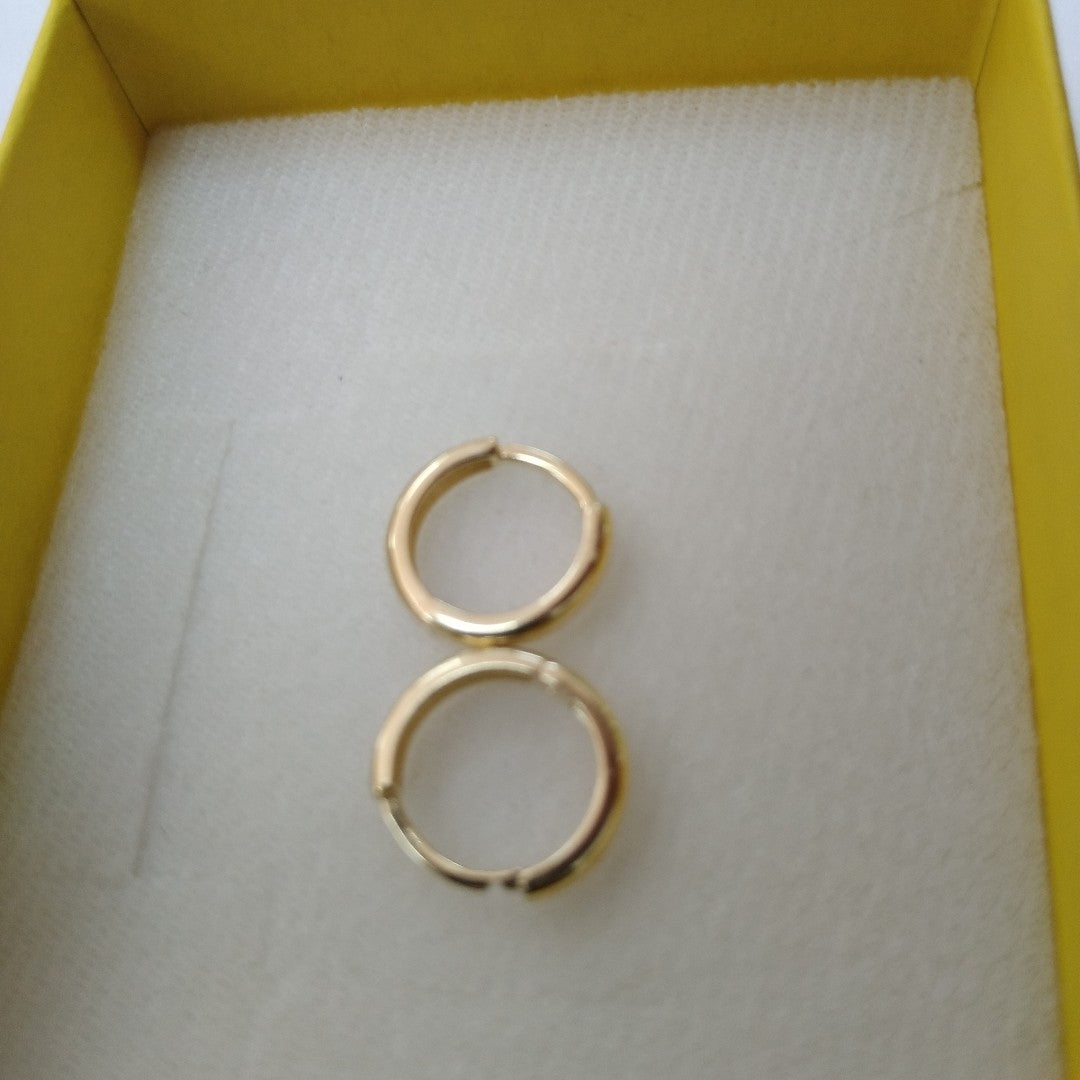 HUGGIES ORO 14K 1.5 (NUEVO)