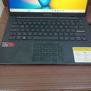 LAPTOP ASUS VIVOBOOK GO 14 E1404FA-NK209W (2023) 512 GB SSD 16 GB RAM (SEMINUEVO)