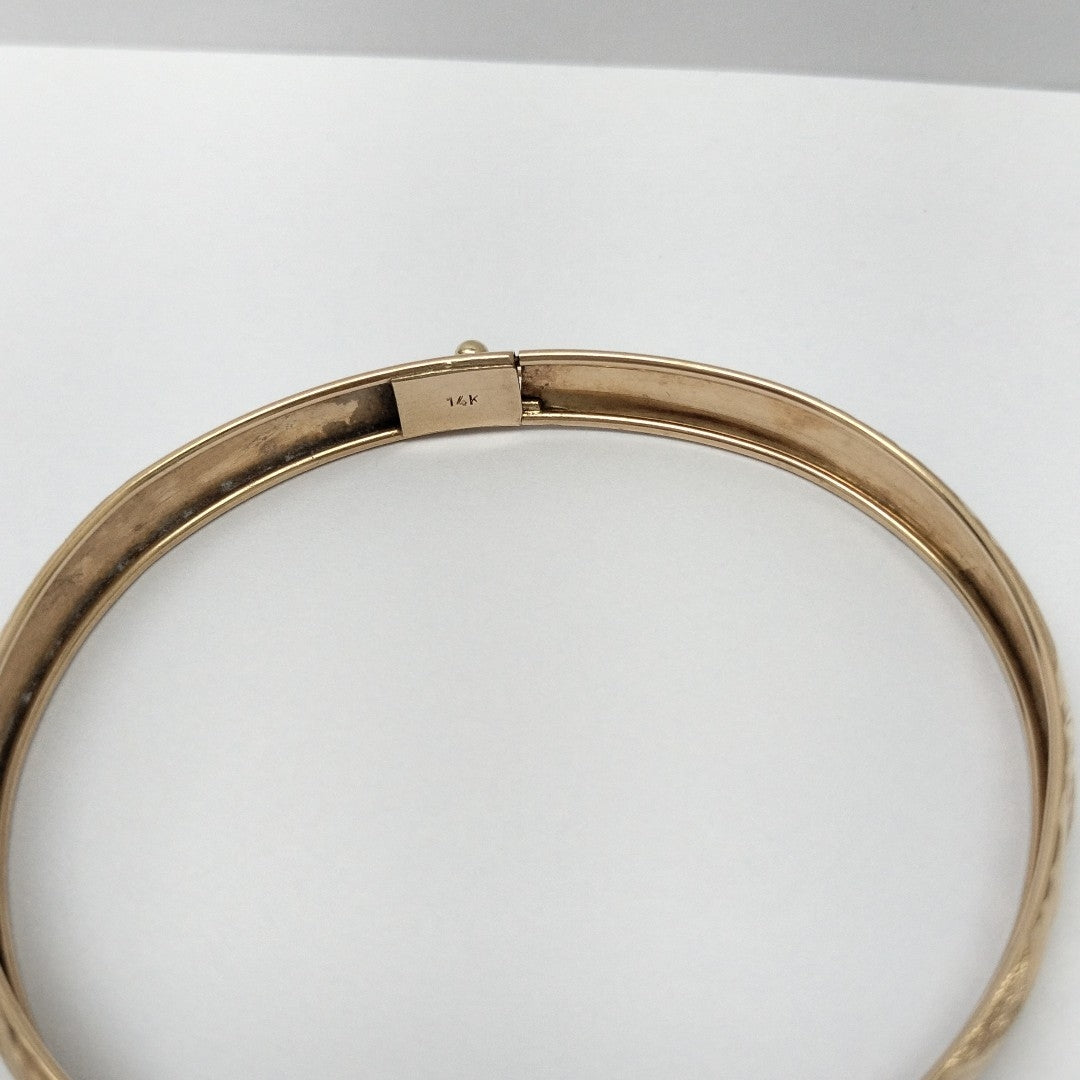 PULSERA RIGIDA. ORO. 14 K 5.8 GRMS (SEMINUEVO)