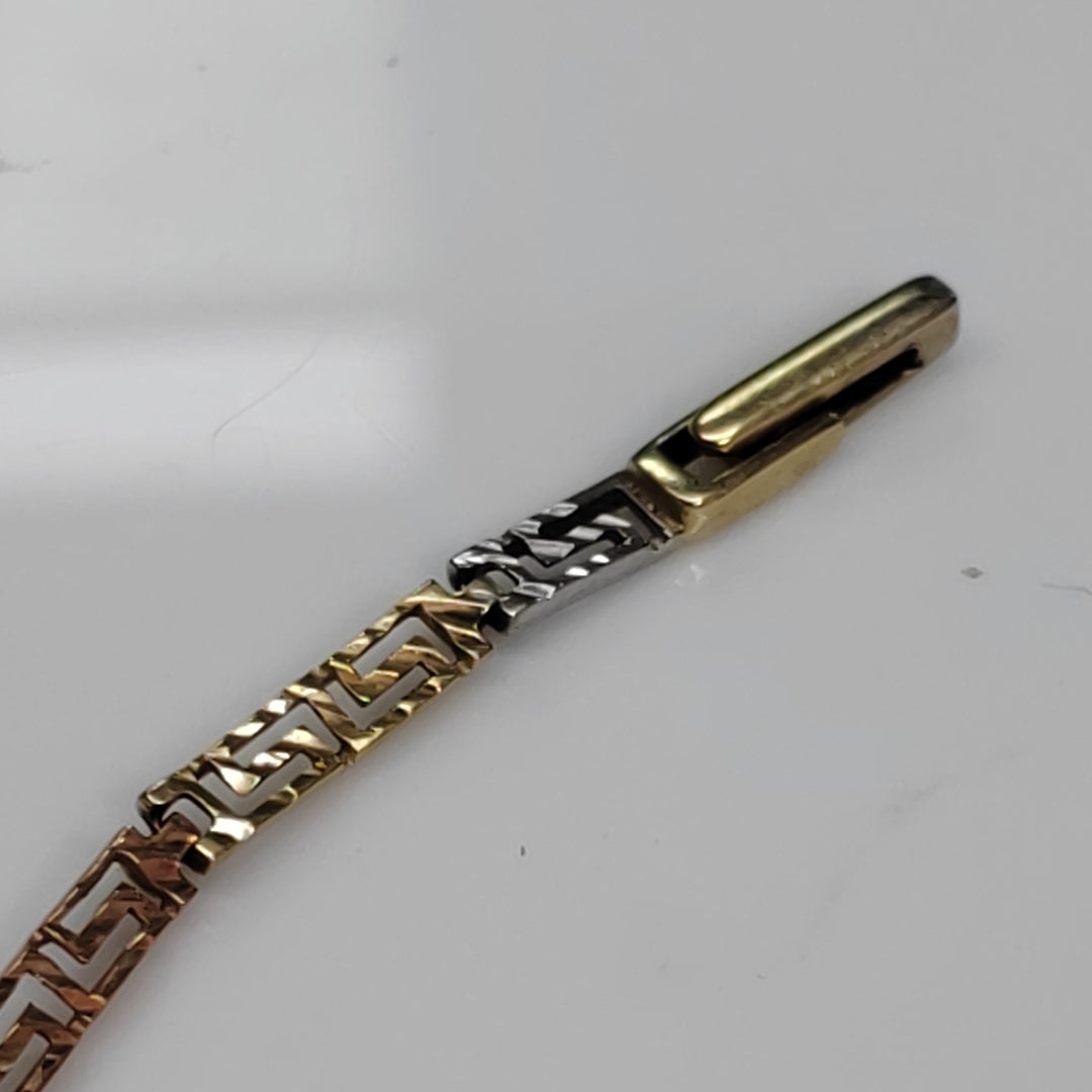 PULSERA. ORO COMBINADO. 14 K 3.7 GRMS (SEMINUEVO)