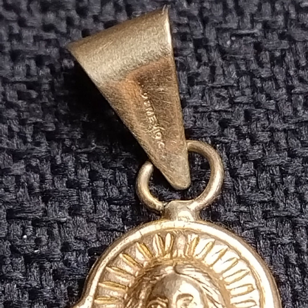 DIJE. ORO COMBINADO. 10 K 3.7 GRMS (SEMINUEVO)