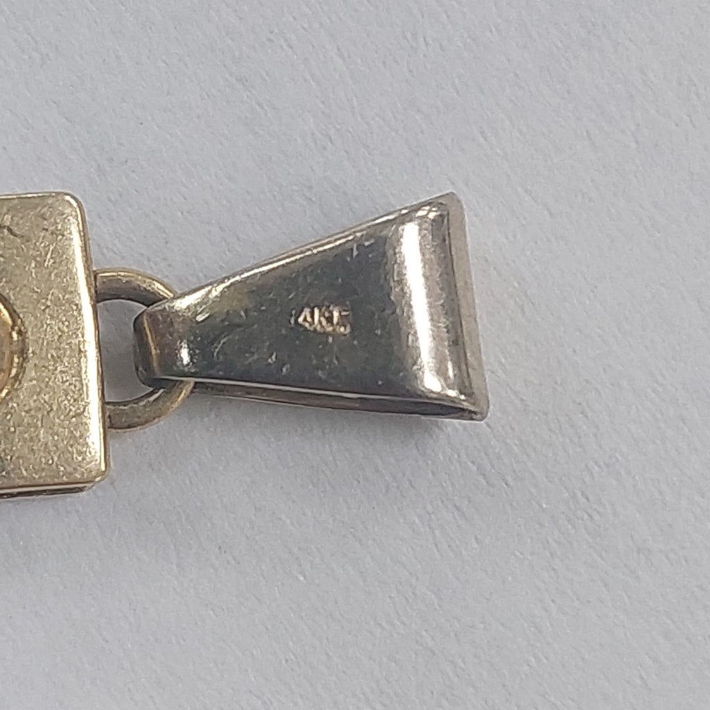 CRUZ. ORO. 14 K 3.6 GRMS (SEMINUEVO)