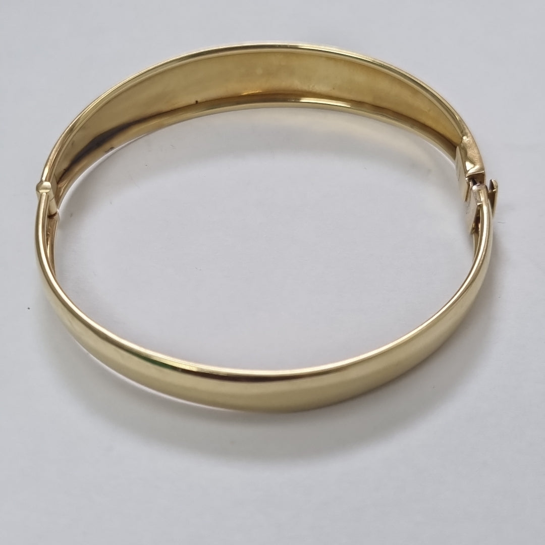 PULSERA RIGIDA. ORO. 14 K 8.6 GRMS (SEMINUEVO)