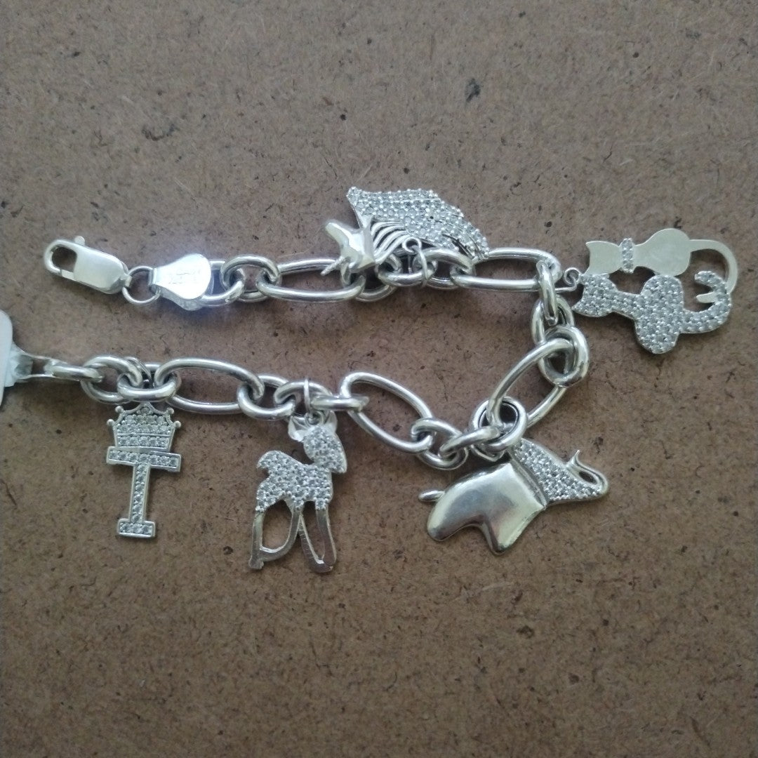 PULSERA ESPECIAL CON DIJES PLATA .925 14.7G (NUEVO)