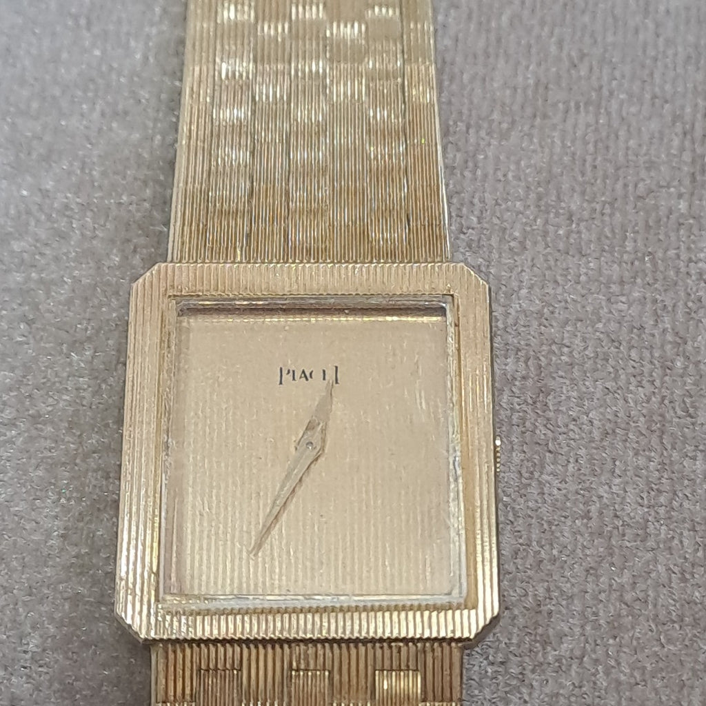 RELOJ CAJA Y PULSO ORO. ORO. 18 K 68.6 GRMS (SEMINUEVO)