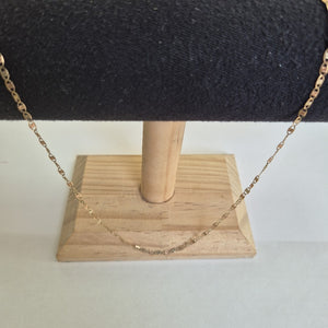 CADENA. ORO, ORO COMBINADO. 10 K 2.1 GRMS (SEMINUEVO)