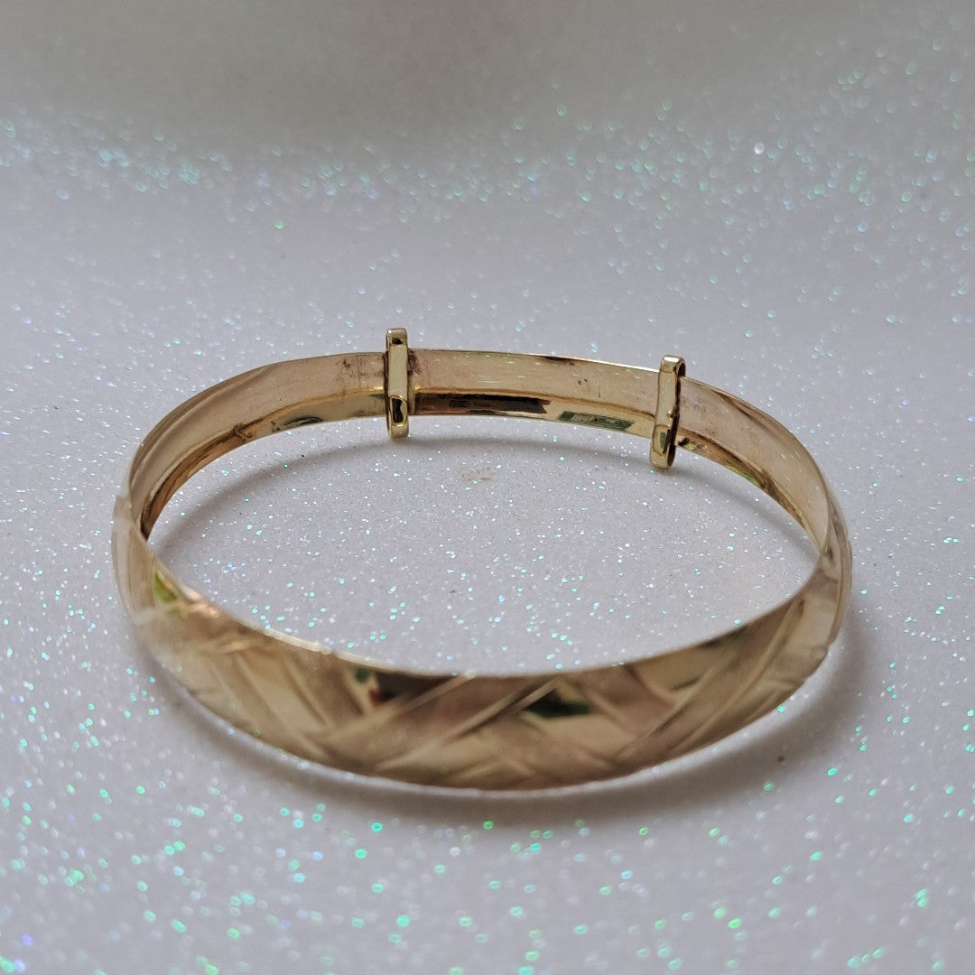 PULSERA RIGIDA. ORO. 10 K 10.5 GRMS (SEMINUEVO)