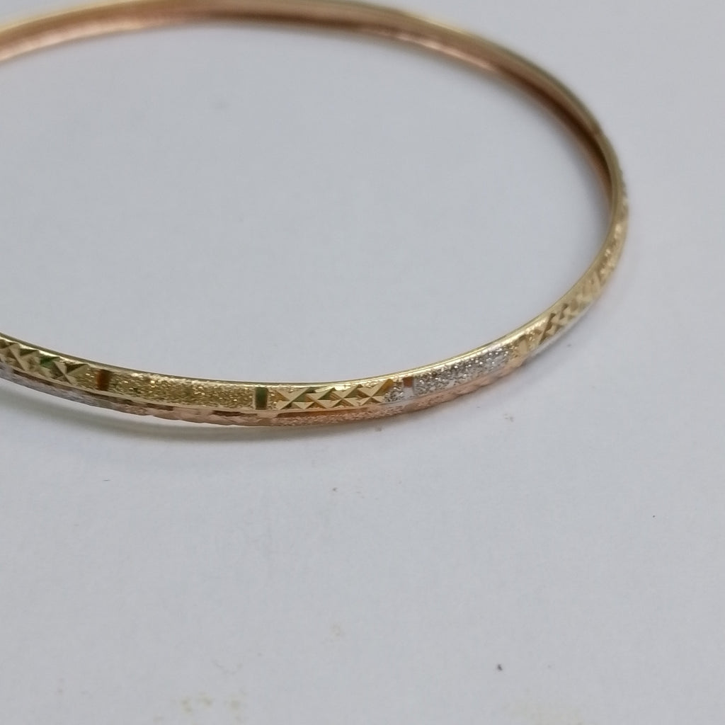 PULSERA RIGIDA. ORO COMBINADO. 14 K 4.3 GRMS (SEMINUEVO)