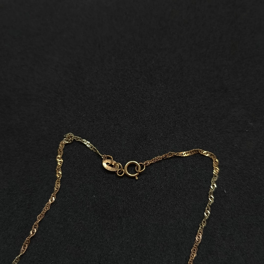 CADENA, DIJE ORO COMBINADO 10 K 1.9 GRMS (SEMINUEVO)