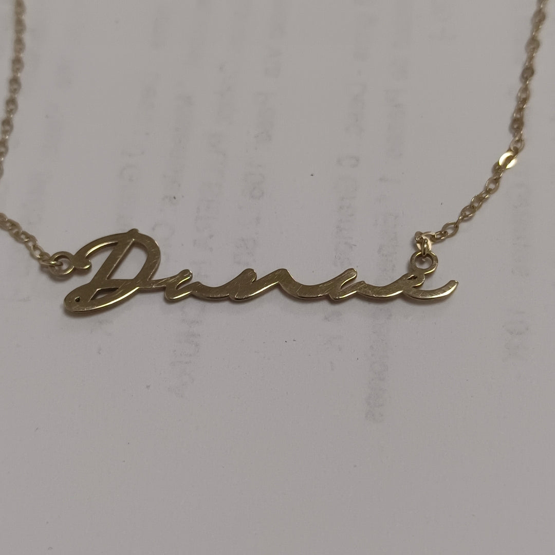 CADENA, DIJE ORO 14 K 1.8 GRMS (SEMINUEVO)
