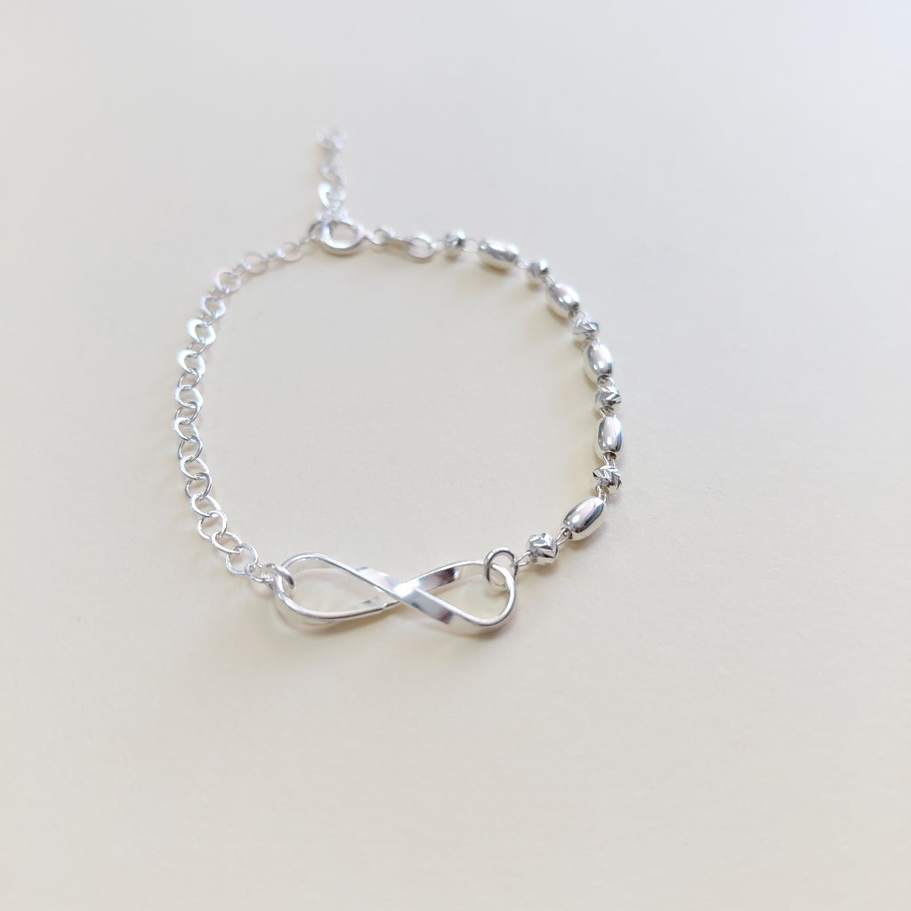 PULSERA TEJIDO INFINITO PLATA .925 18 CM 2.3 GR (NUEVO)