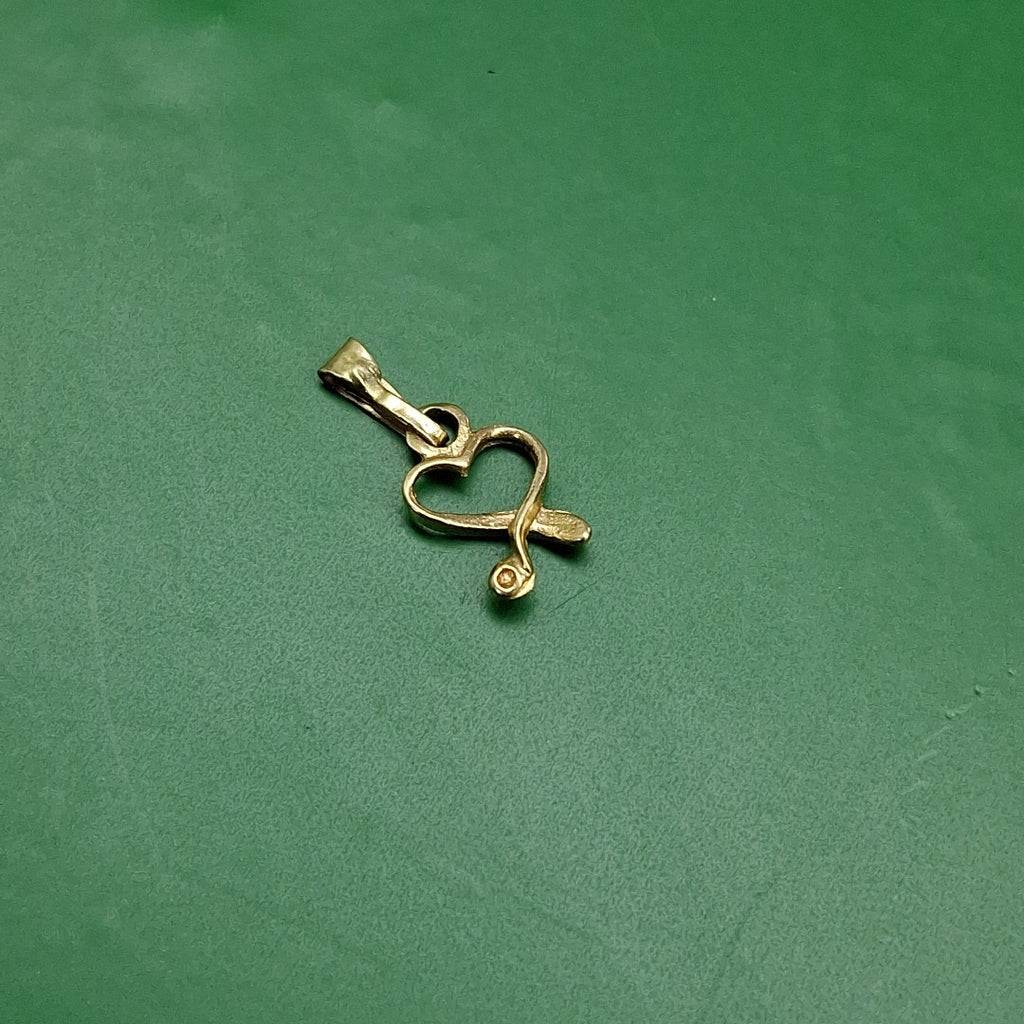 DIJE ORO 14 K 0.4 GRMS (SEMINUEVO)