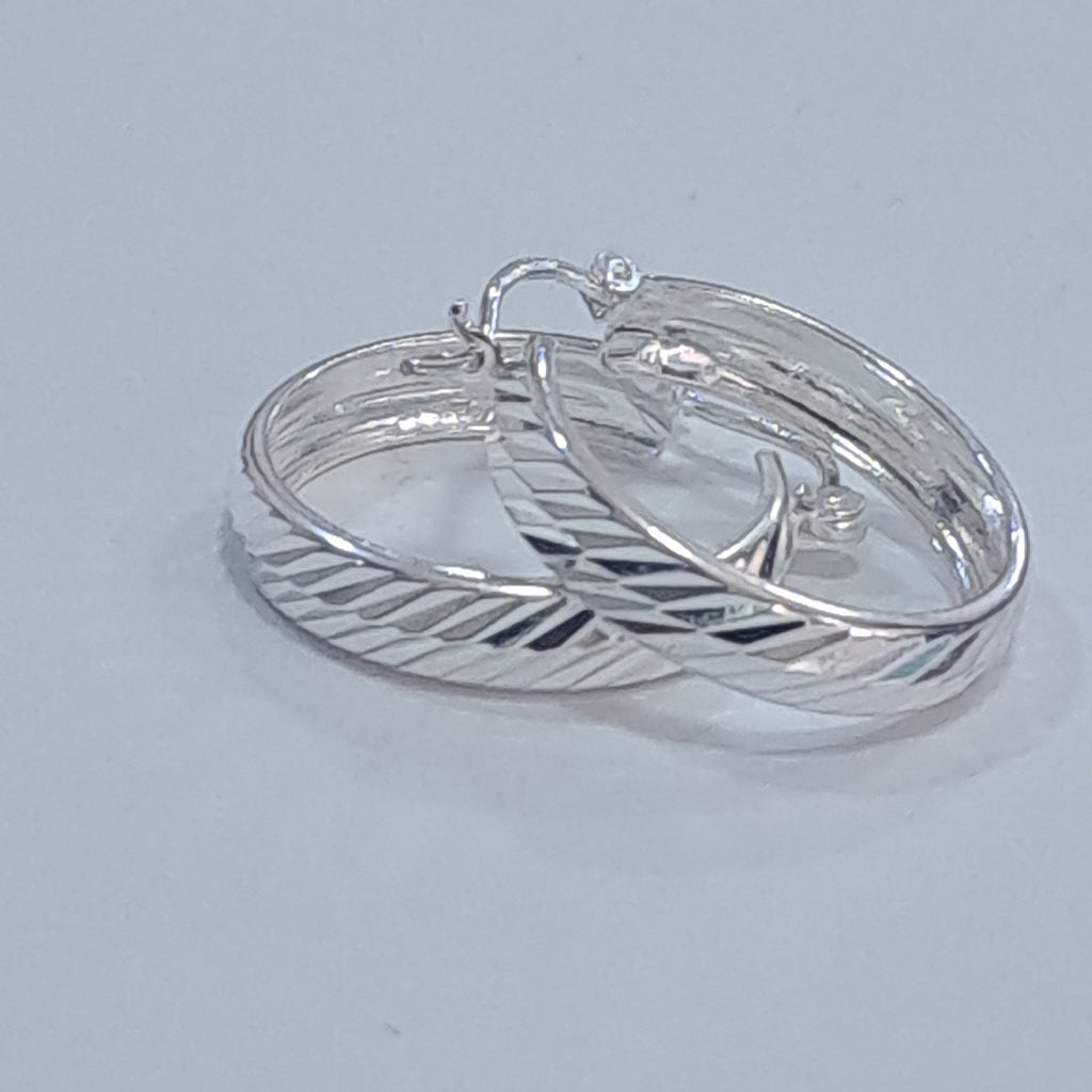 PAR ARRACADAS LABRADAS PLATA .925 2.4 GR (NUEVO)