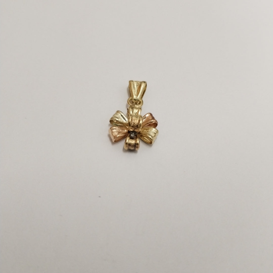 DIJE ORO, ORO COMBINADO 10 K 0.9 GRMS (SEMINUEVO)