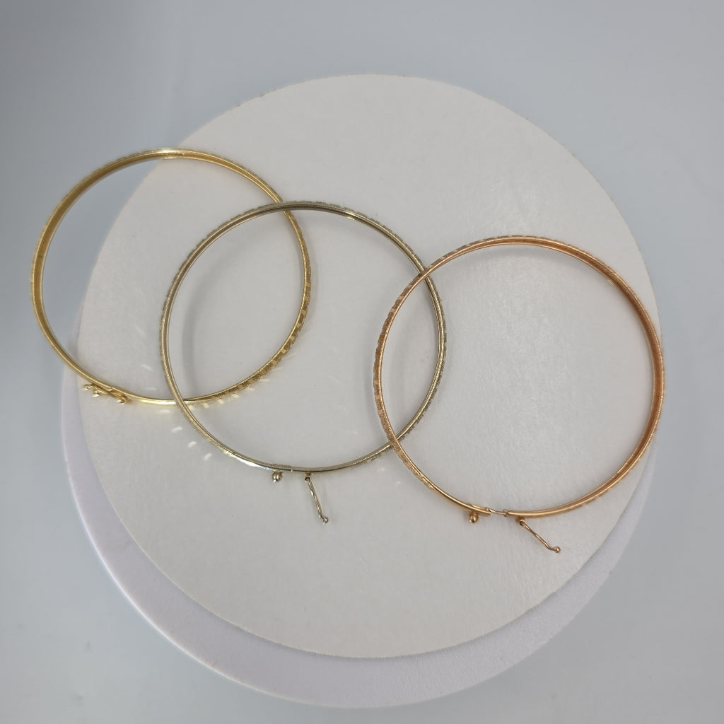 PULSERA RIGIDA ORO COMBINADO 14 K 12.8 GRMS (SEMINUEVO)