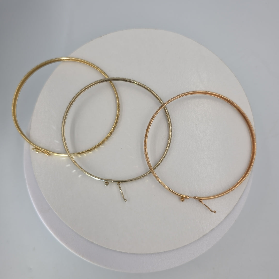 PULSERA RIGIDA ORO COMBINADO 14 K 12.8 GRMS (SEMINUEVO)