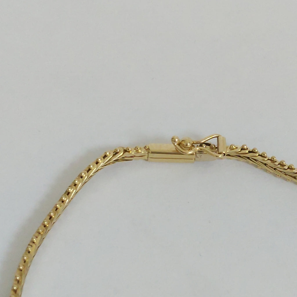 PULSERA ORO COMBINADO 14 K 6.6 GRMS (SEMINUEVO)
