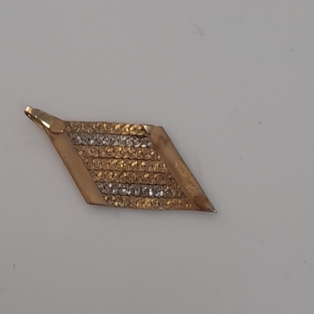 DIJE ORO COMBINADO 14 K 0.9 GRMS (SEMINUEVO)