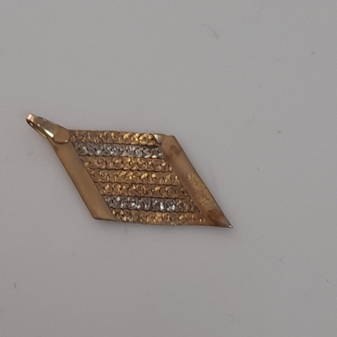 DIJE ORO COMBINADO 14 K 0.9 GRMS (SEMINUEVO)