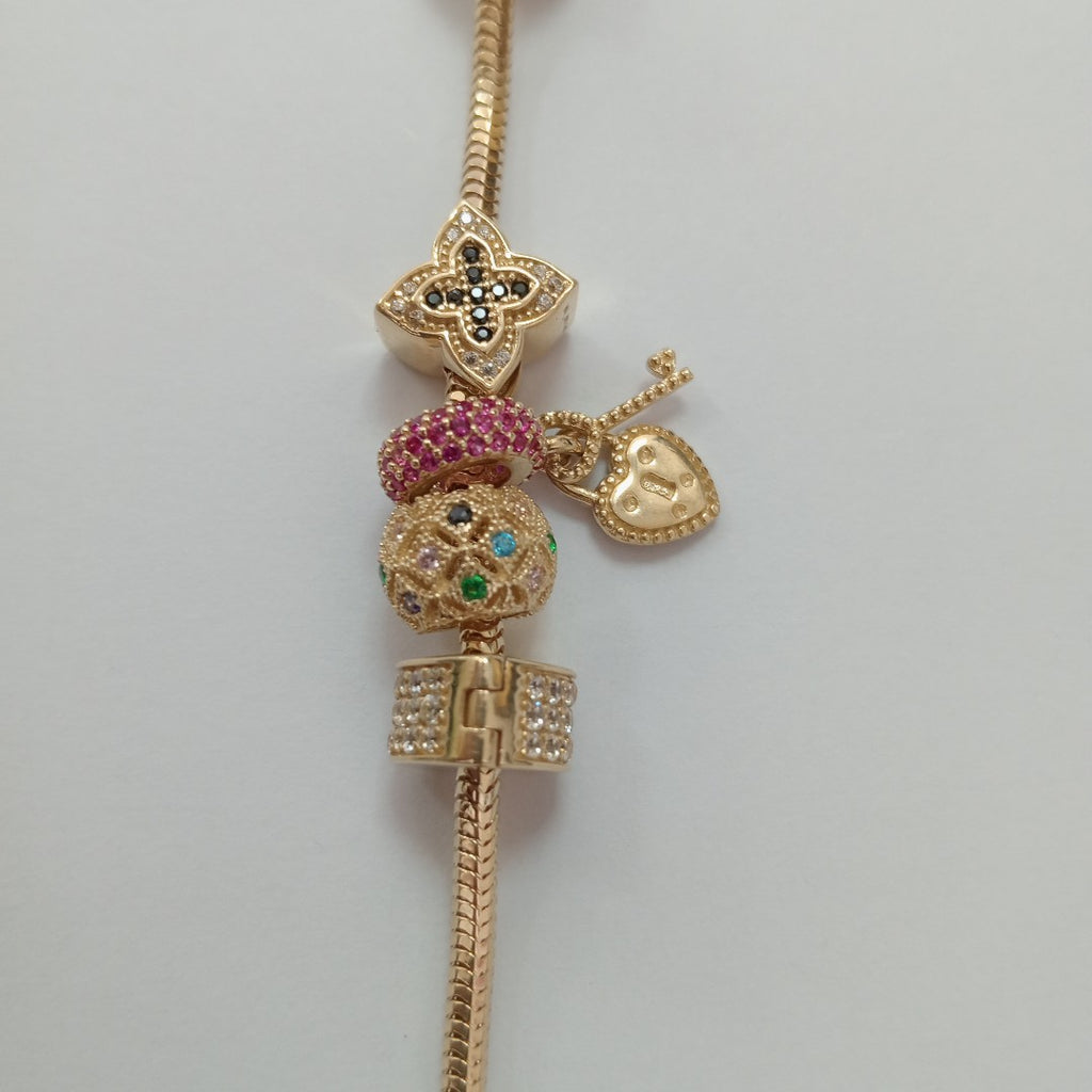 PULSERA CHARM ORO 14K 16.8 (NUEVO)
