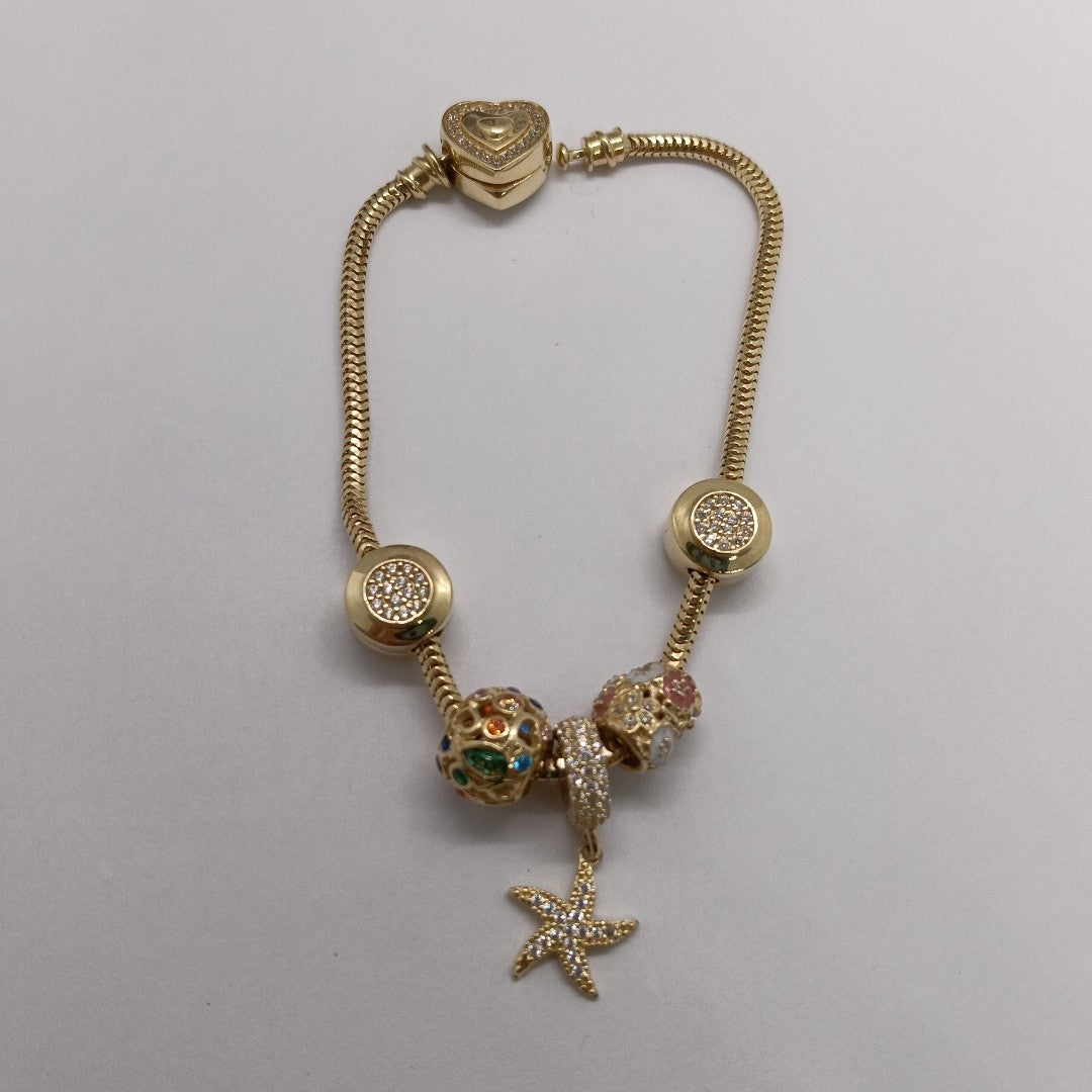 PULSERA CHARM ORO 14K 17.2 (NUEVO)