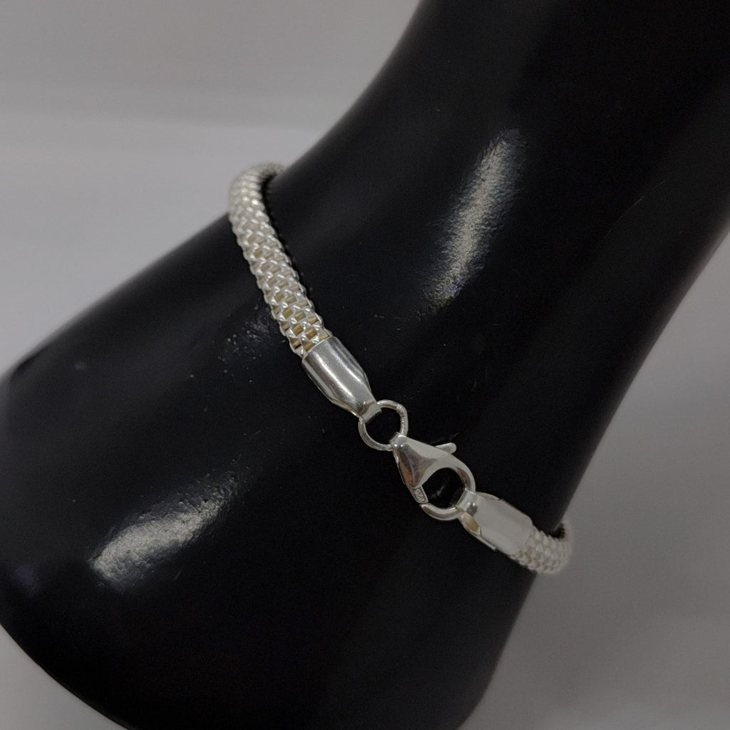 PULSERA TEJIDO ESPECIAL PLATA .925 18 CM 4.8 GR (NUEVO)