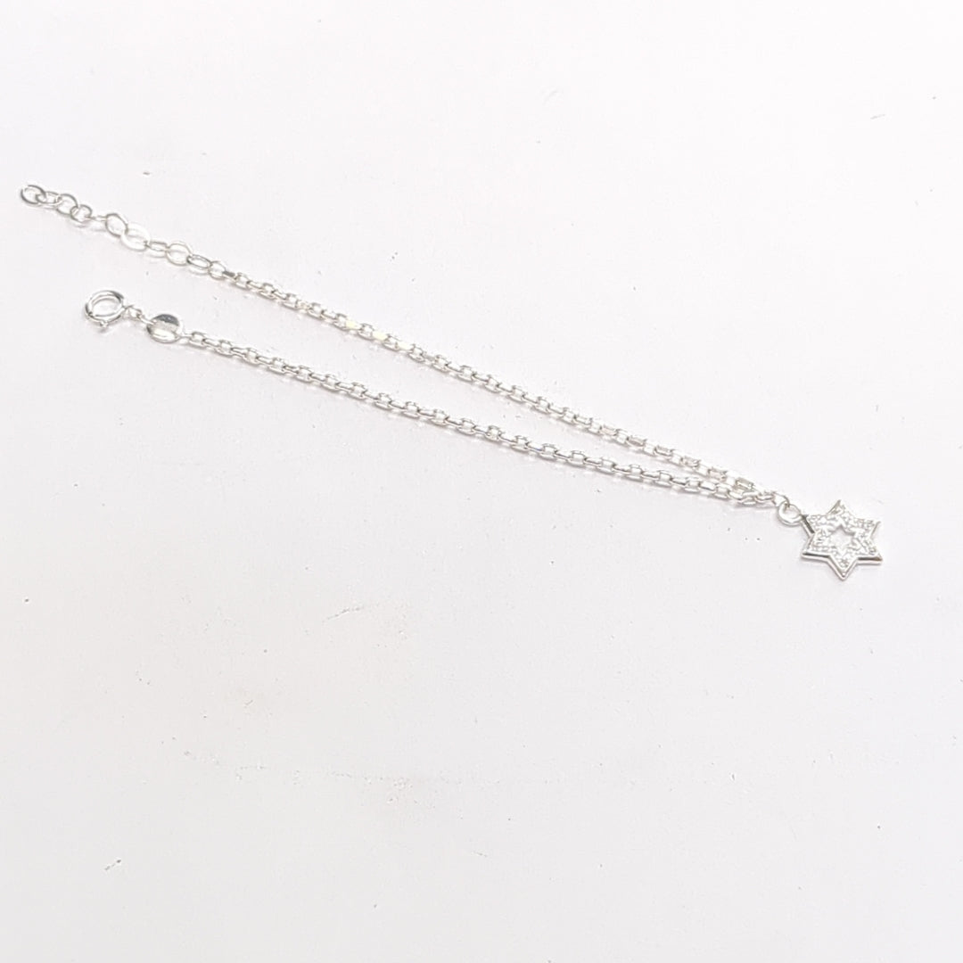 PULSERA TEJIDO ESPECIAL CON DIJE DE ESTRELLA CON CIRCONIAS PLATA .925 18 CM 2.5 GR (NUEVO)