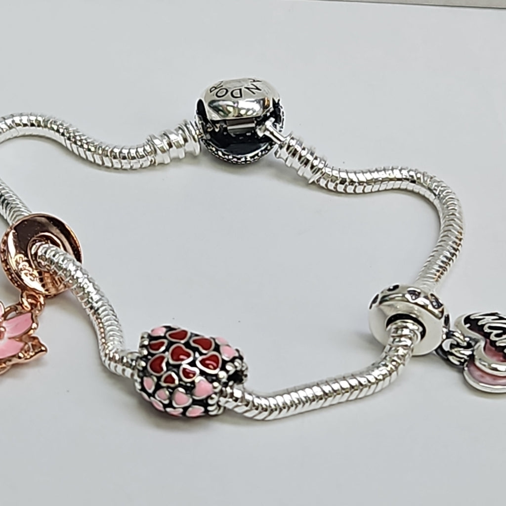 PULSERA TEJIDO ARTICULADA CON CHARMS PLATA .925 21 CM 15.2 GR (NUEVO)