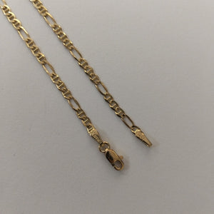 CADENAS TEJIDO FIGARO GUCHI ORO 10K 55 CM 5 GR (NUEVO)