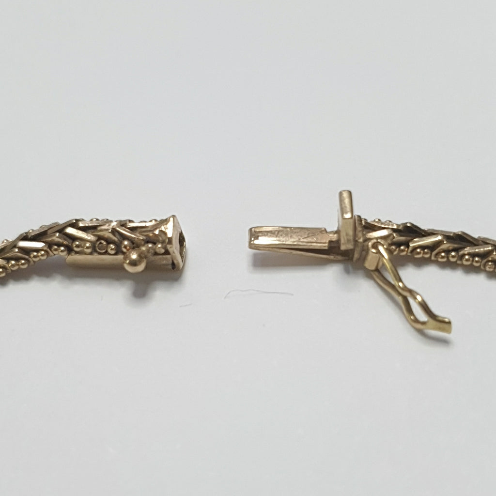 PULSERA ORO COMBINADO 14 K 8.2 GRMS (SEMINUEVO)