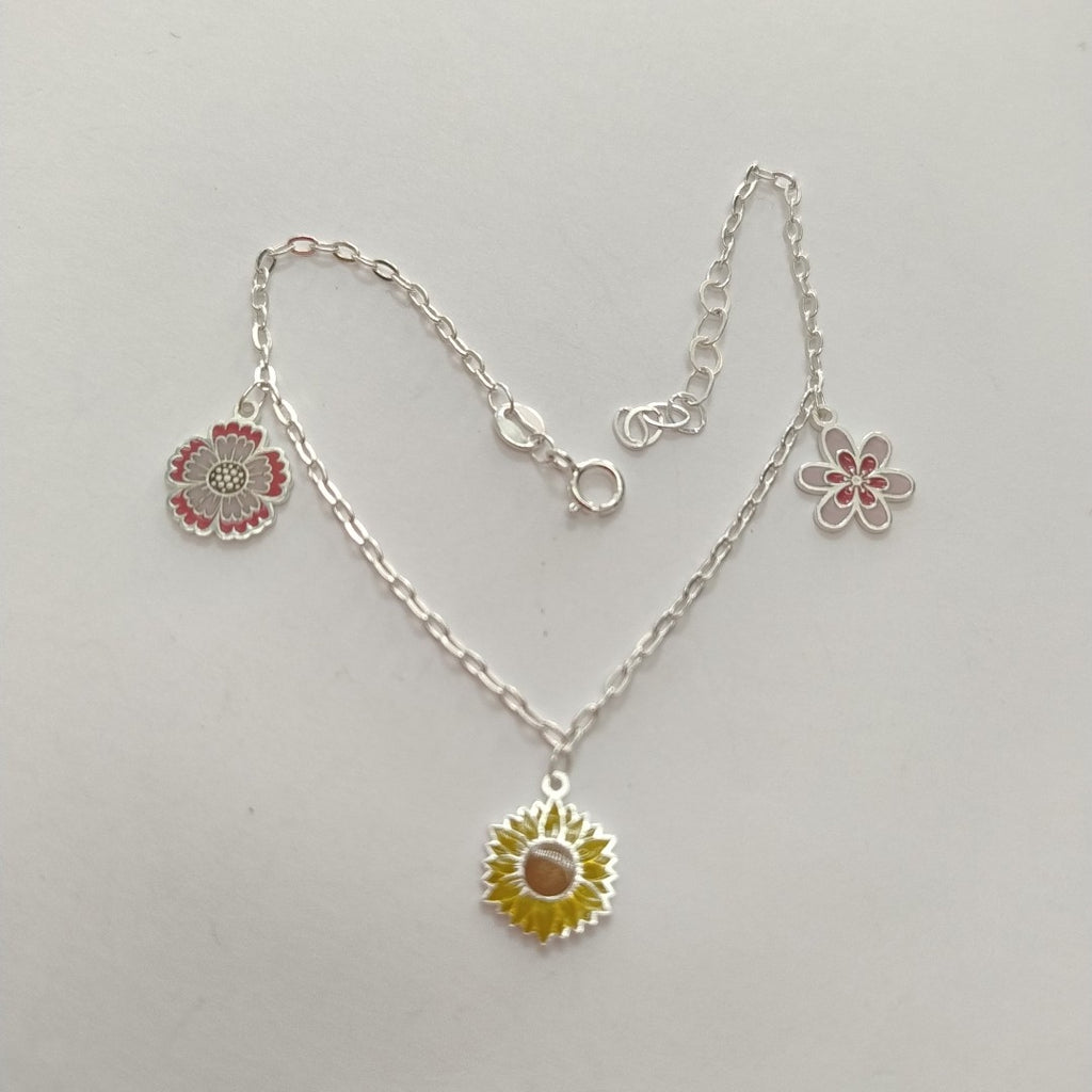 PULSERA TEJIDO ESPECIAL CON DIJE FLORES PLATA .925 21 CM 2.3 GR (NUEVO)