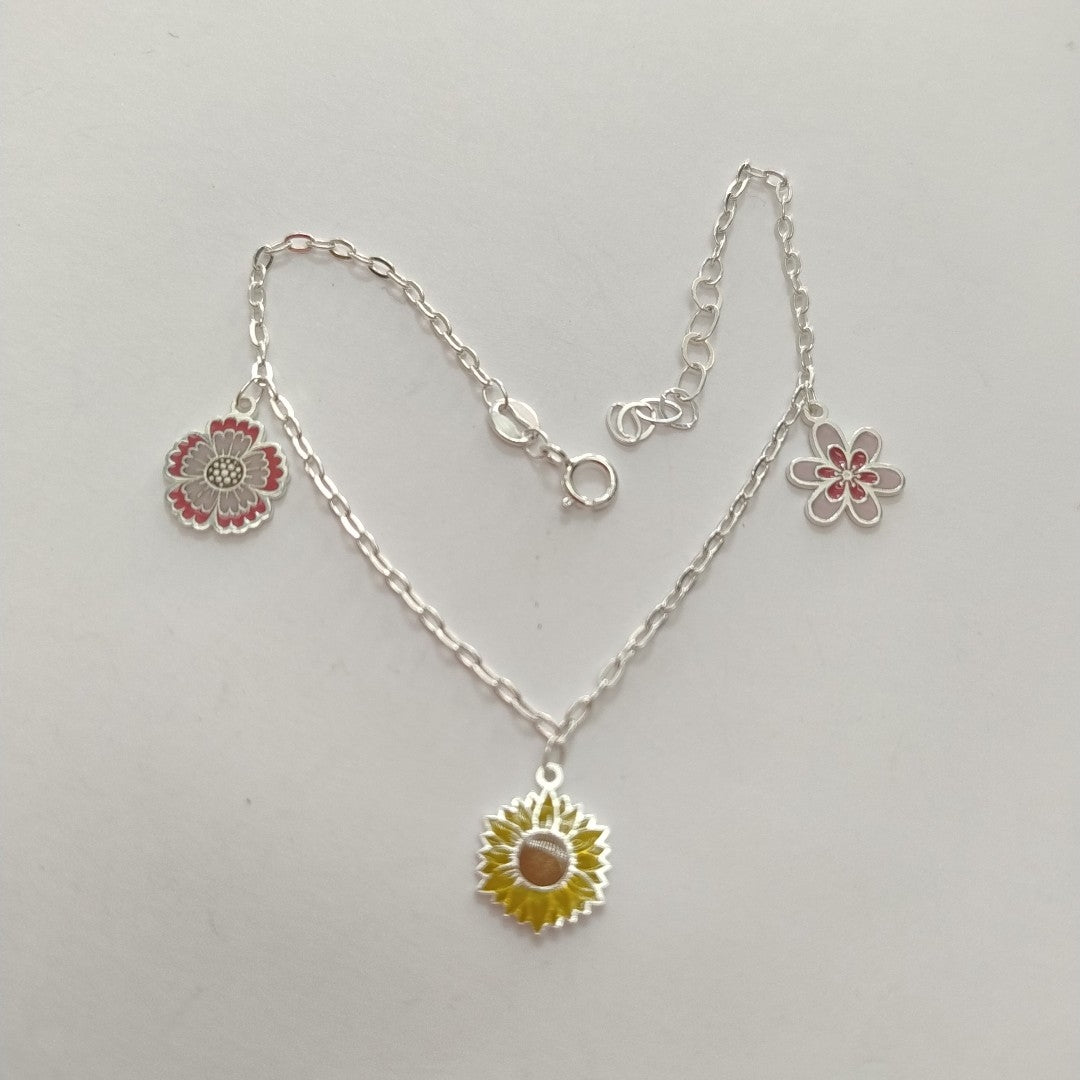 PULSERA TEJIDO ESPECIAL CON DIJE FLORES PLATA .925 21 CM 2.3 GR (NUEVO)