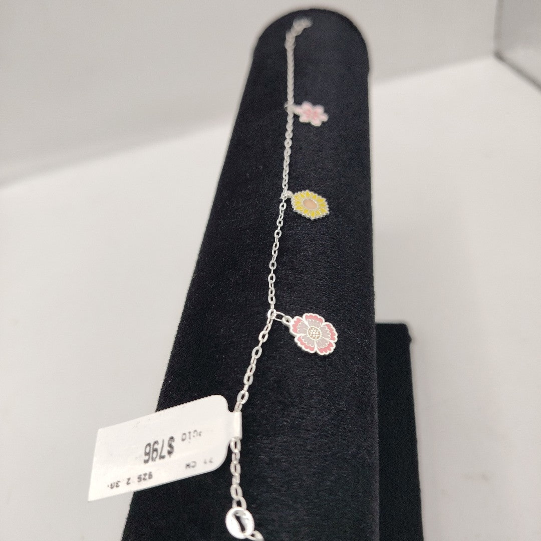 PULSERA TEJIDO ESPECIAL CON DIJE FLORES PLATA .925 21 CM 2.3 GR (NUEVO)