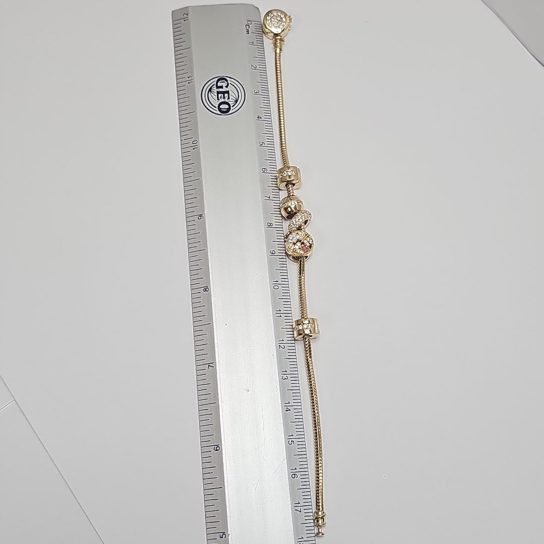 PULSERA CHARM ORO 14K 15.8 (NUEVO)